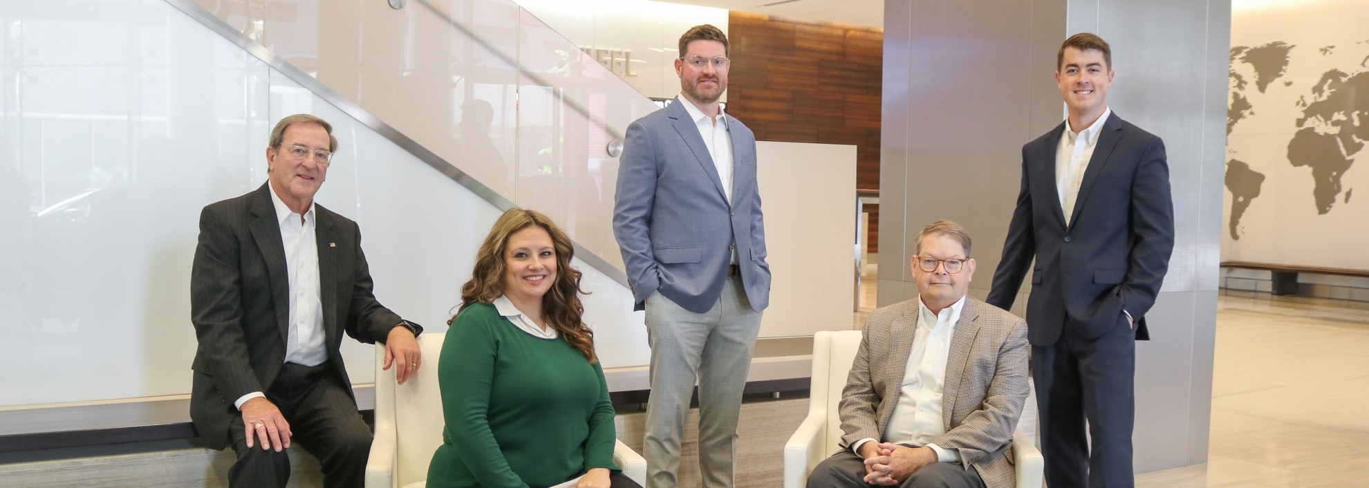 Integritas Wealth Management Group team image in Stifel Headquarters lobby